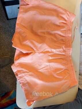 Reebok Women’s Peach-Orange Athletic Shorts